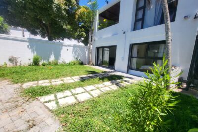 Modern Renovated 3-Bedroom Apartment Walking Distance to the Beach